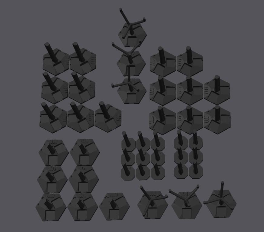 Collection of hexagonal bases and stands for displaying a 3D printed spaceship fleet models