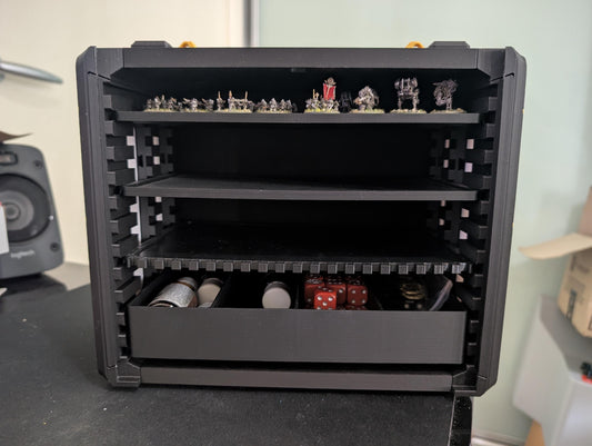 Layered Industries miniatures carrying case with multiple shelves and space for dice and accessories