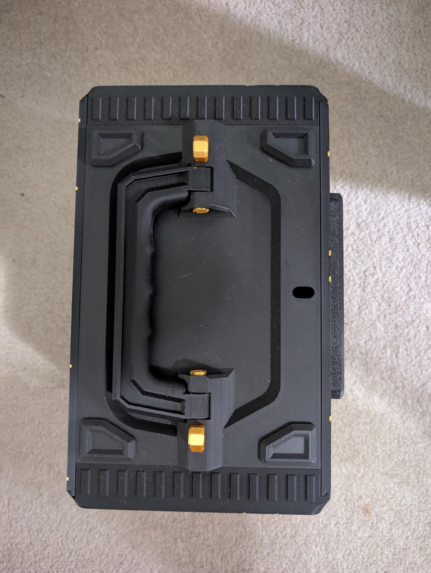 Durable miniatures carrying case from Layered Industries with secure handle and rugged design