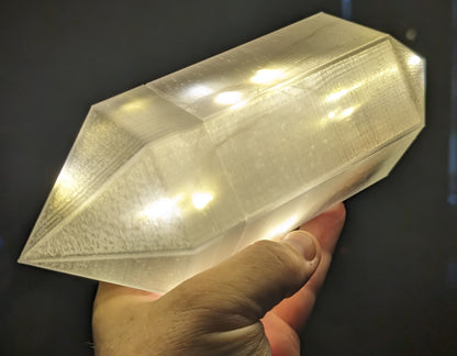 Layered Industries fantasy glowing crystal prop held in hand, perfect for wargame terrain.