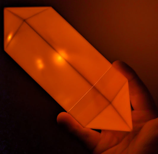 Fantasy glowing crystal prop held in hand, perfect for wargame terrain and tabletop fantasy settings
