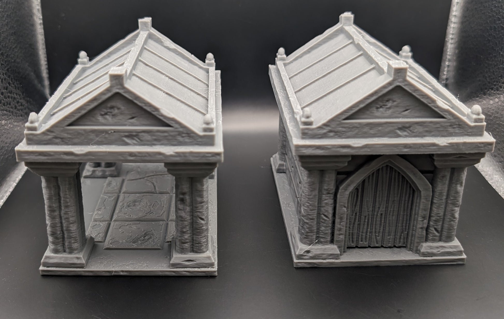 Layered Industries graveyard terrain set featuring detailed mausoleums and stone textures