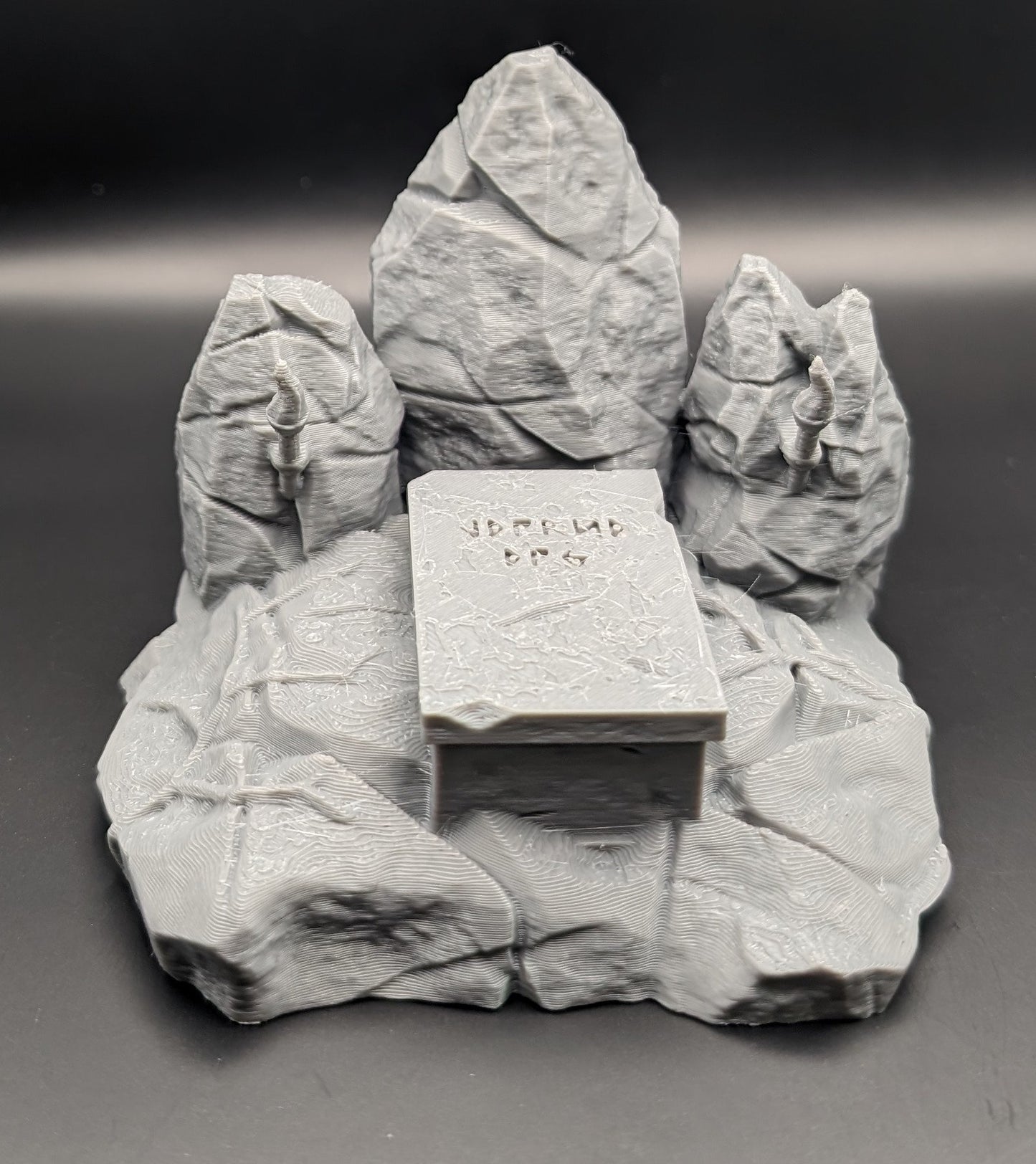 Layered Industries Wargame Terrain featuring a stone altar surrounded by three rugged rock formations