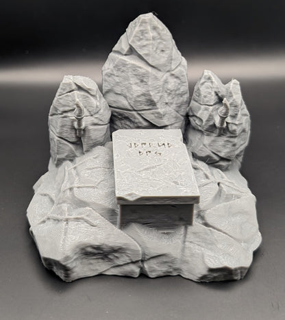 Layered Industries Wargame Terrain featuring a stone altar surrounded by three rugged rock formations