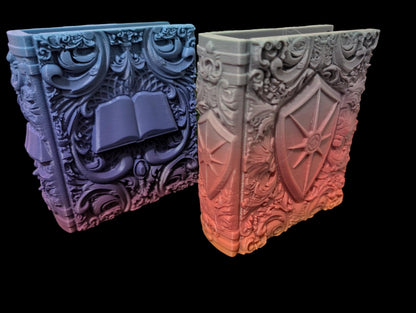 Layered Industries large RPG dice box with intricate designs of a book and shield
