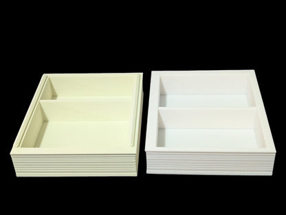 Layered Industries RPG dice box with compartments for organizing and storing dice and accessories