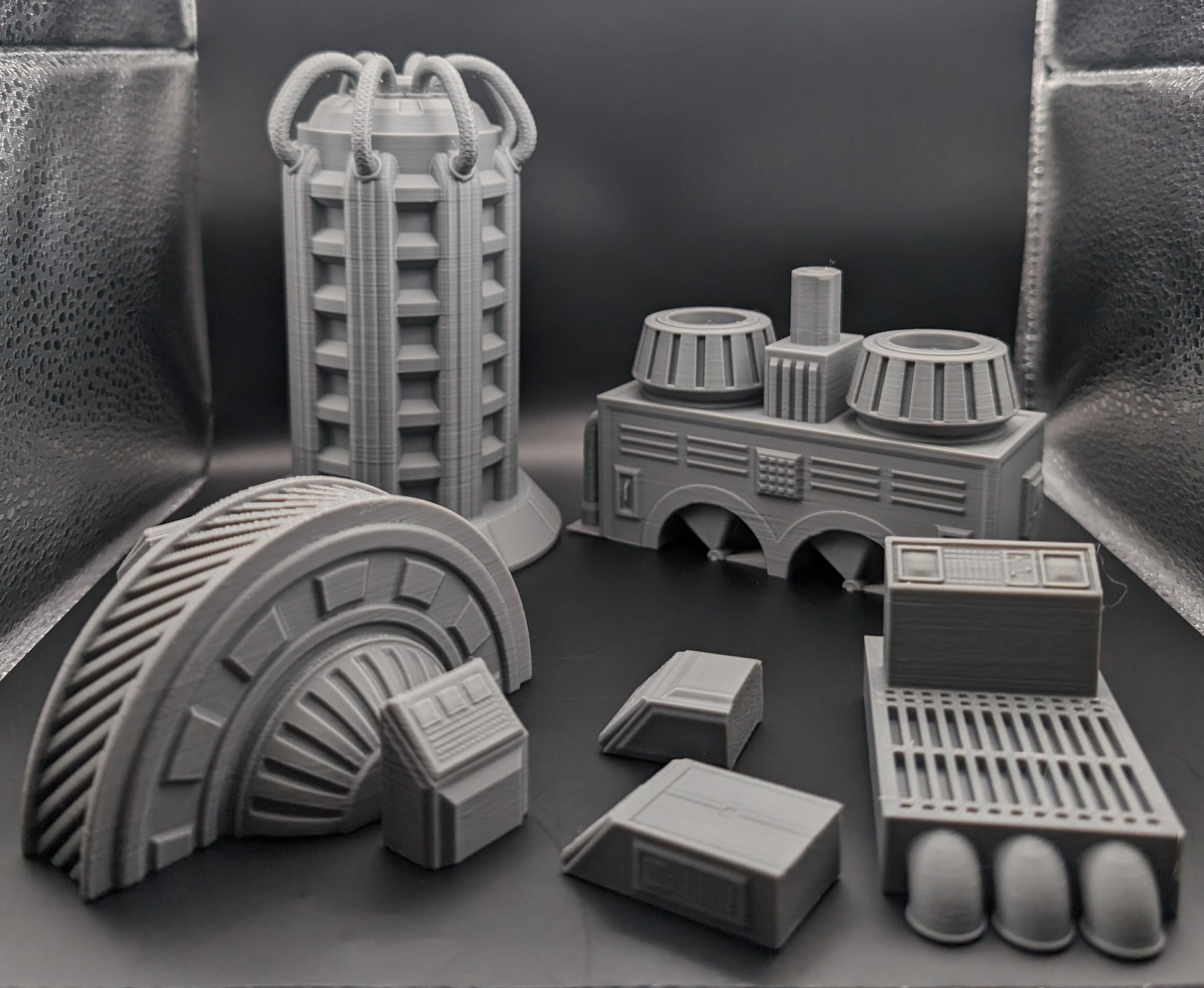 Layered Industries sci-fi terrain 3D prints including futuristic structures and detailed bases for tabletop games